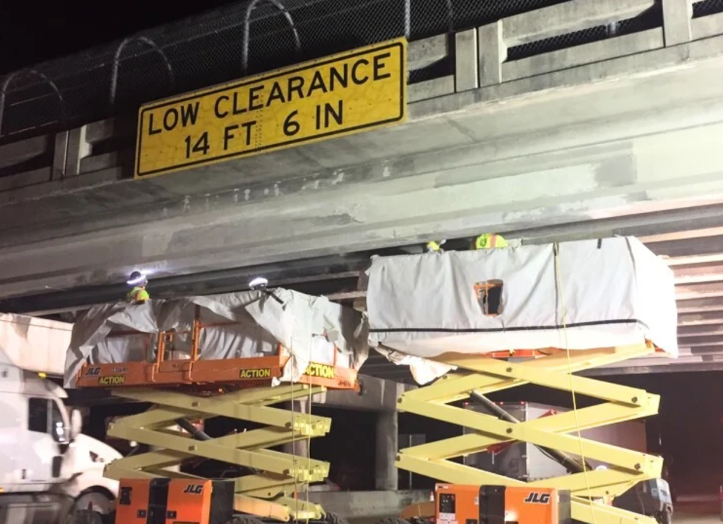 Photo of Public Works team members repairing Sheridan Street Bridge.